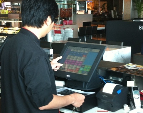 Thai Riffic Store Manager trying out his new Aloha POS System